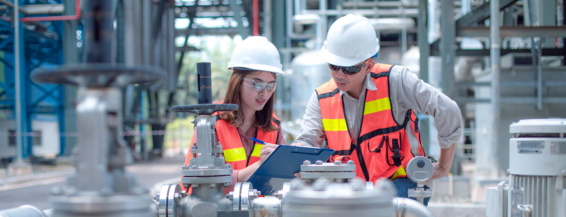 Machine maintenance in an industrial setting by two people