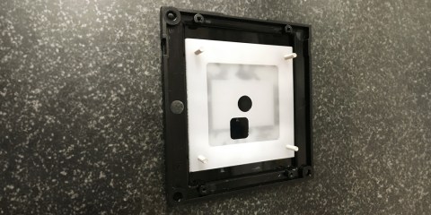 Wall-mounted housing for access readers